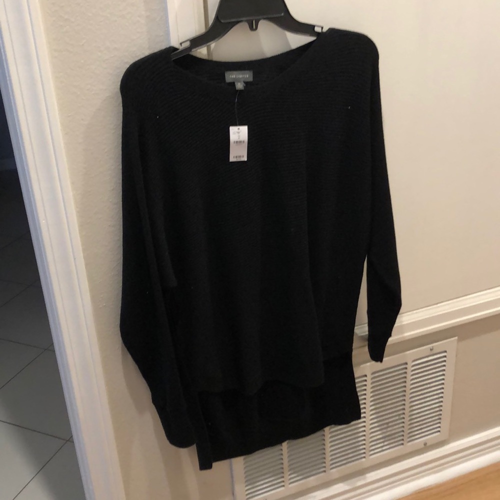 The limited black sweater